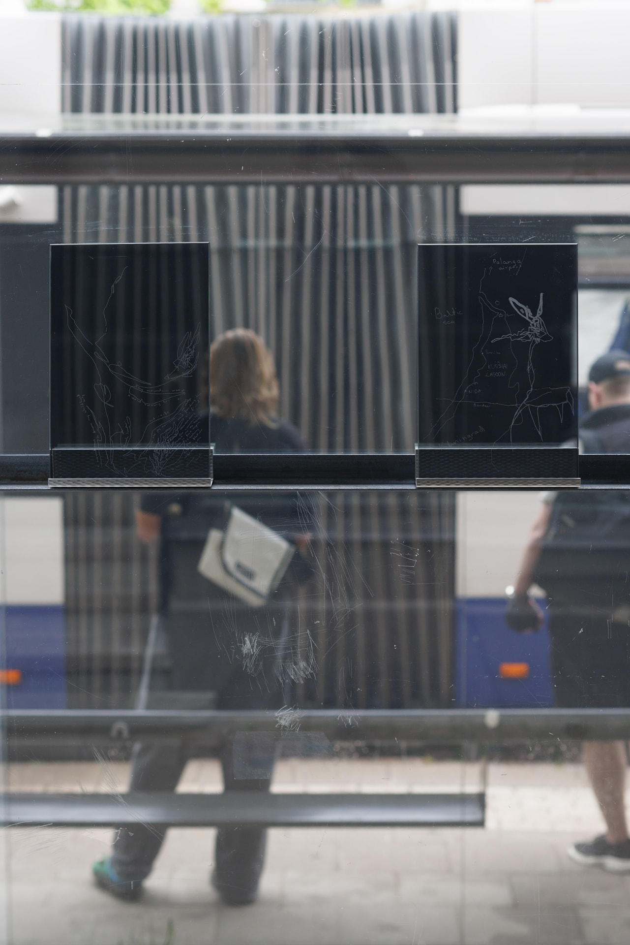 Circulation — engraved semi-transparent plates seen through glass