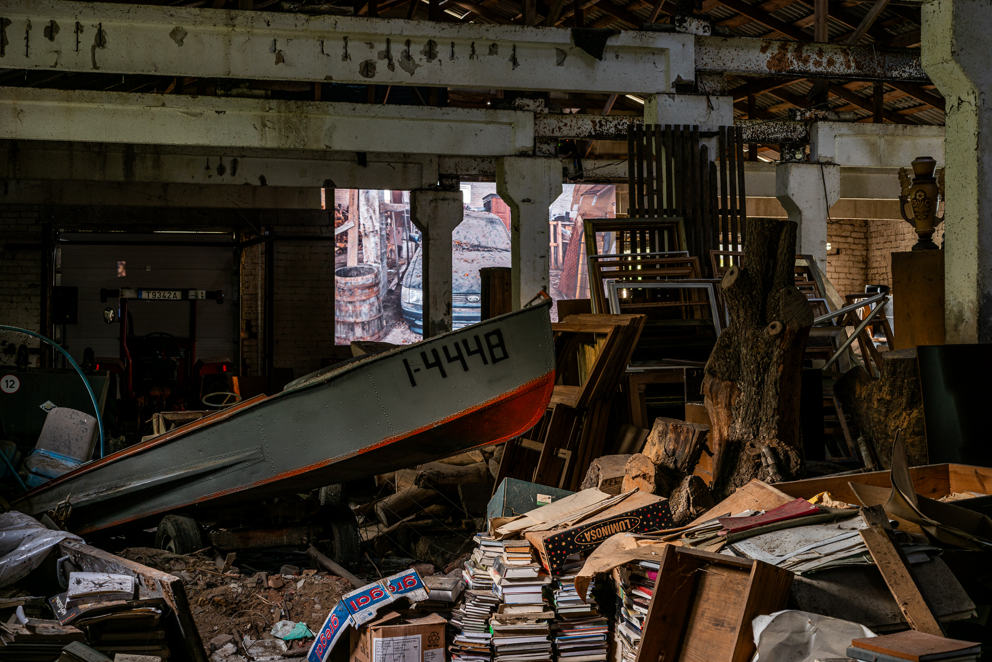 Ferma installation — boat among stored objects